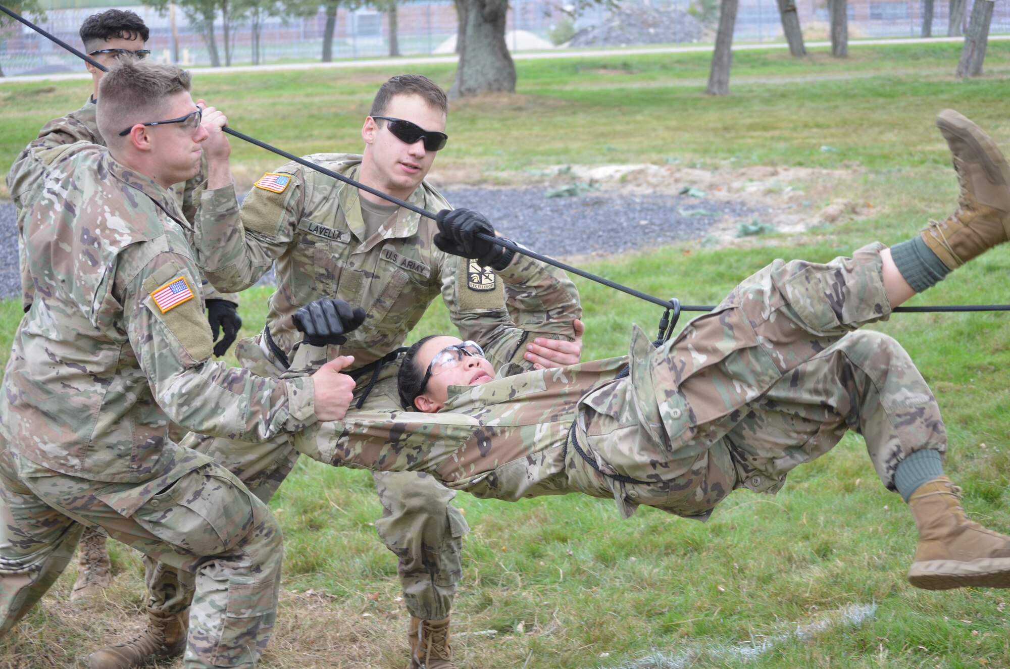 Cadets from the Rochester University of Technology work together to complete the one-rope bridge event during the 2nd Brigade Ranger Challenge Oct. 23, 2021 at Joint Base McGuire-Dix-Lakehurst. The winning team will represent the brigade at the Sandhurst Military Skills competition at West Point in 2022.