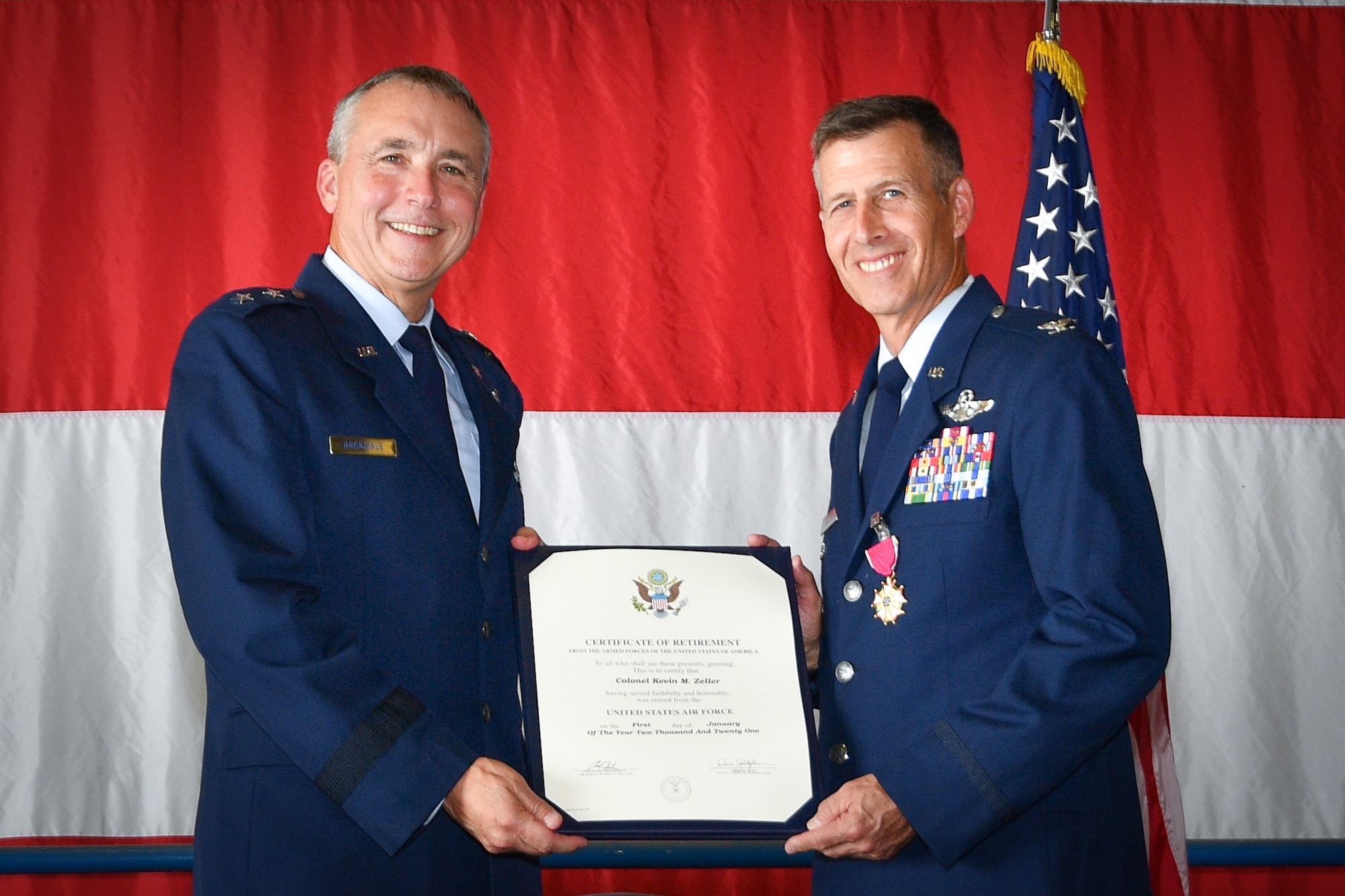 (left) Maj. Gen. John Breazeale, Mobilization Assistant to the Commander, HQ Air Combat Command, Joint Base Langley-Eustis, Va., retires former 301st Fighter Wing Director of Staff Col. Kevin "Fuzzy" Zeller during a retirement ceremony at Naval Air Station Joint Reserve Base Fort Worth, Texas, Oct. 23, 2021. Zeller was a command pilot with more than 4,901 flying hours including 345 combat hours [and 3,058 flying hours in the F-16 Fighting Falcon] in his more than 30 years of service. (U.S. Air Force photo by Jeremy Roman)