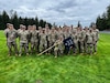 Charlie company 100th Battalion 442nd Infantry Regiment pose for a photo for the first time at Joint Base Lewis McChord following its uncasing ceremony. The company is newly relocated to JBLM after many years at Pago-Pago, American Samoa.