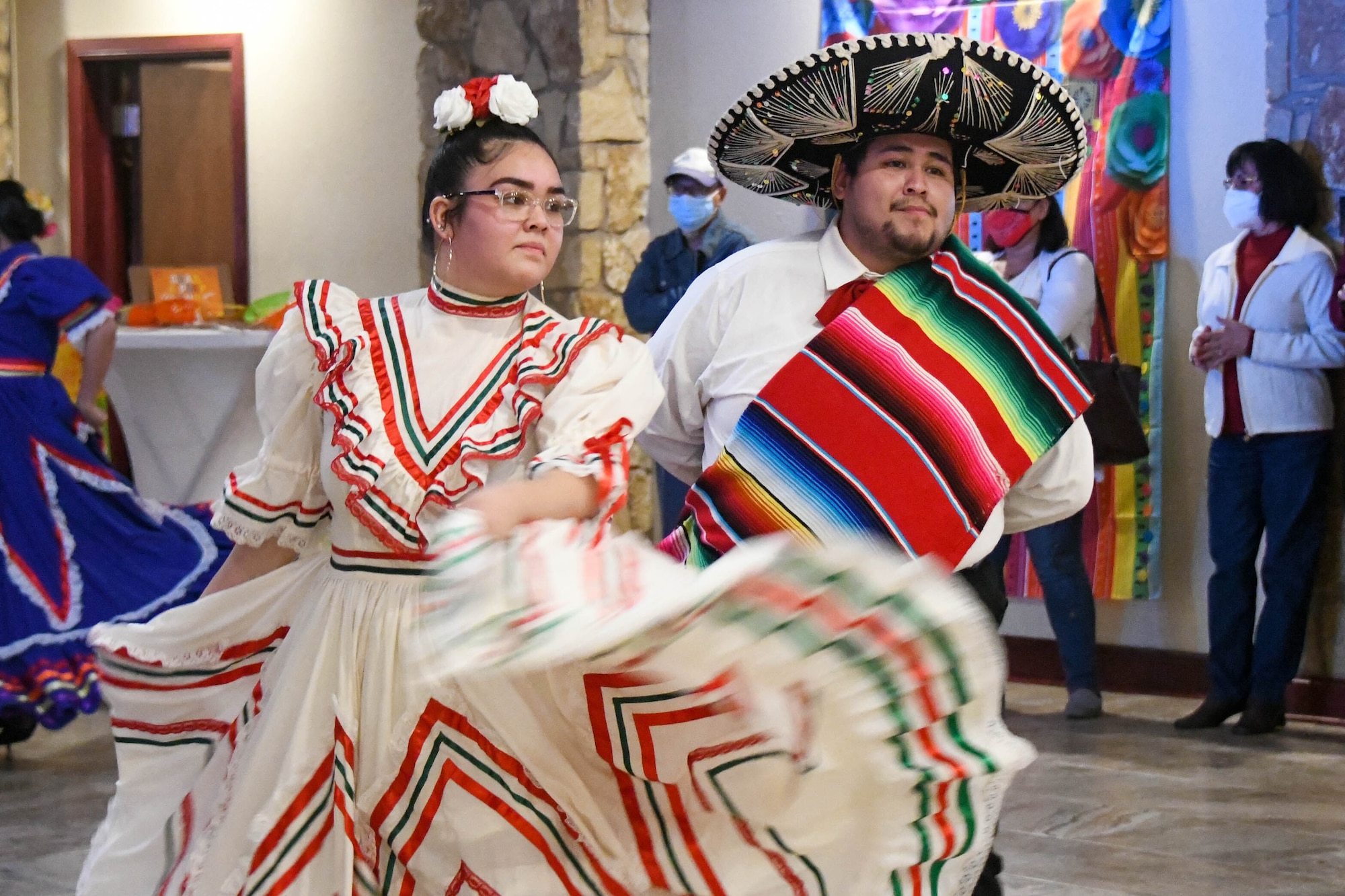 Ziclali Laylah Garcia and Alfredo Miguel Martinez, Lawton Mexican Folkloric Dance performers, celebrate Hispanic Heritage Month through dance at a fiesta on Altus Air Force Base, Oklahoma, October 15, 2021. Hispanic Heritage Month started in 1968 as Hispanic Heritage Week under President Lyndon Johnson and was expanded by President Ronald Reagan in 1988 to cover a 30-day period starting on September 15 and ending on October 15. (U.S. Air Force photo by Airman 1st Class Trenton Jancze)
