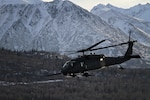 An Alaska Air National Guard HH-60 Pave Hawk from the 210th Rescue Squadron on a training flight near Joint Base Elmendorf-Richardson in February 2013.