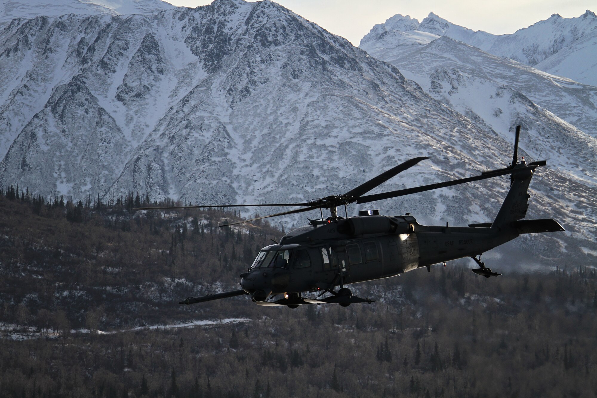 An Alaska Air National Guard HH-60 Pave Hawk from the 210th Rescue Squadron on a training flight near Joint Base Elmendorf-Richardson in February 2013.