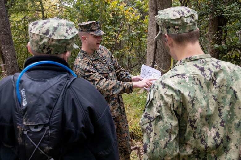 U.S. Marine Corps 2nd Lt. Williams C. Russell, Projects Officer G3, conducts a class on terrain modeling at Marine Corps Base Quantico, Oct. 23, Va. Marine Corps Recruiting Command volunteered to provide mentorship and training during the U.S. Naval Sea Cadet Corps' three-day field training exercise. (U.S Marine Corps photo by Lance Cpl. Gustavo Romero)