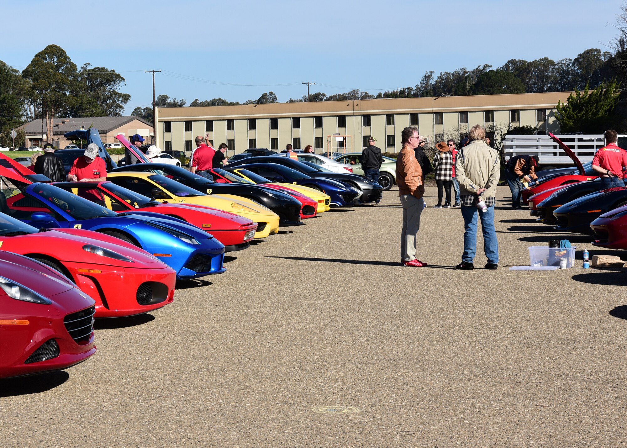 Base members view exotic and classic cars on display during Vandenberg’s Ninth Annual Exotic Car Show Oct. 23, 2021, at Vandenberg Space Force Base, Calif. The 30th Force Support Squadron hosted the event which displayed Ferrari’s, Lamborghini’s and other exotic and classic cars. (U.S. Space Force photo by Airman First Class Tiarra Sibley)