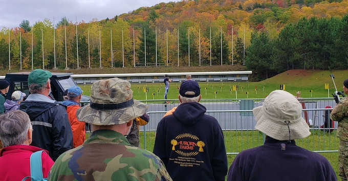 Tour participants observe a biathlete’s training at Camp Ethan Allen Training Site, Oct. 22, 2021. Military retirees and neighbors of the range, among others, participated in a public tour of CEATS where they received an overview of range operations and visited military barracks; construction of a new Army Mountain Warfare School; weapon ranges; and the biathlon program. (U.S. Army photo by Maj. J. Scott Detweiler)