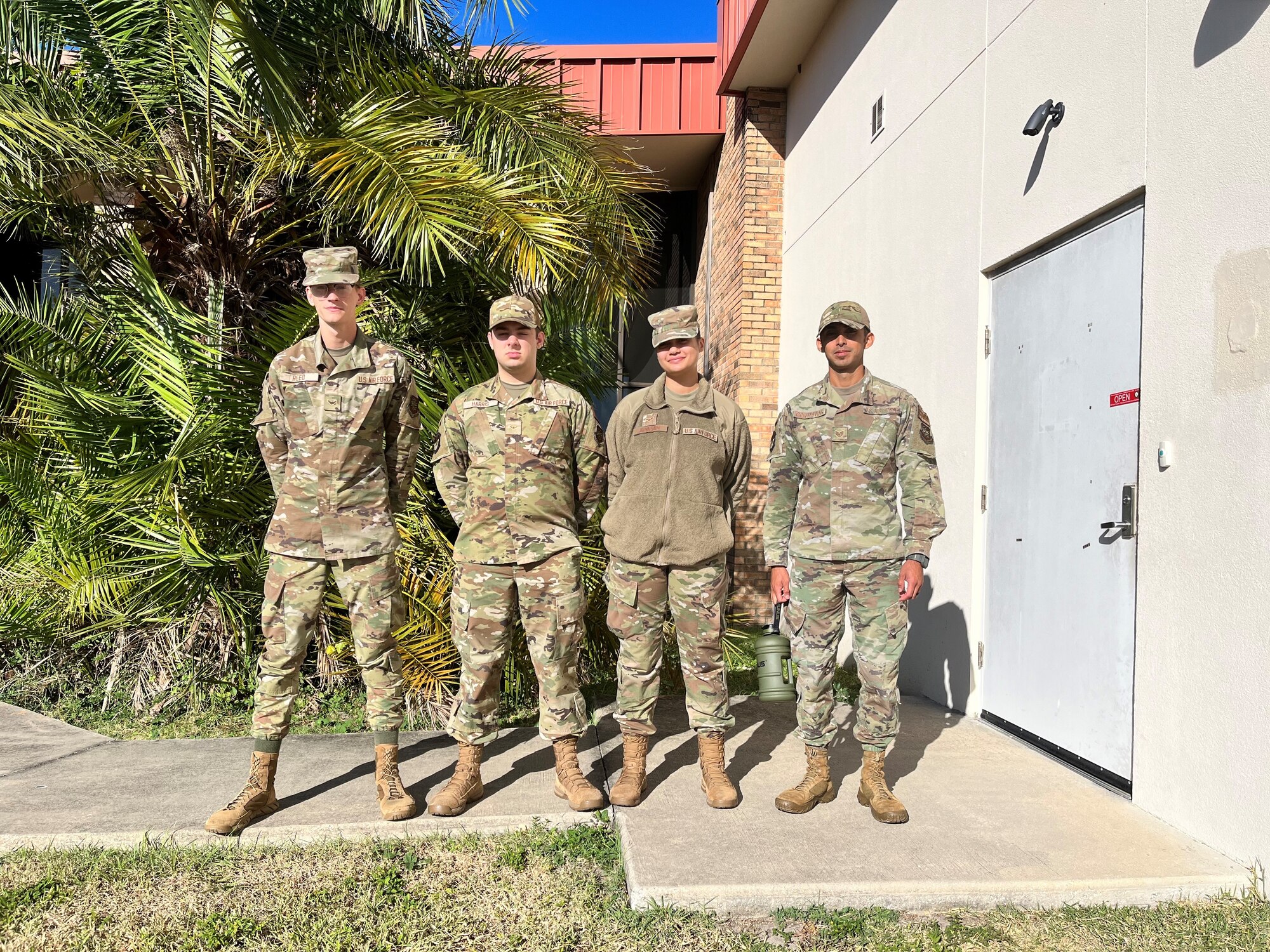 Cyber-awareness team members from the 6th Communications Squadron, MacDill Air Force Base, Florida, pose for a photo Oct. 19, 2021. The cyber-awareness team disseminated the latest cybersecurity best practices and relevant cybersecurity information throughout the 6th Air Refueling Wing, briefing at various squadrons and events during the National Cybersecurity Awareness Month observed in October. From left, Airman 1st Class Zachary Reed, cybersecurity technician, Airman Edward Harris, cybersecurity technician, Airman 1st Class Chauntel Johnson, cybersecurity technician and Staff Sgt. Eduardo Contreras, information systems security manager. (U.S. Air Force photo by Master Sgt. Winella Rivera)