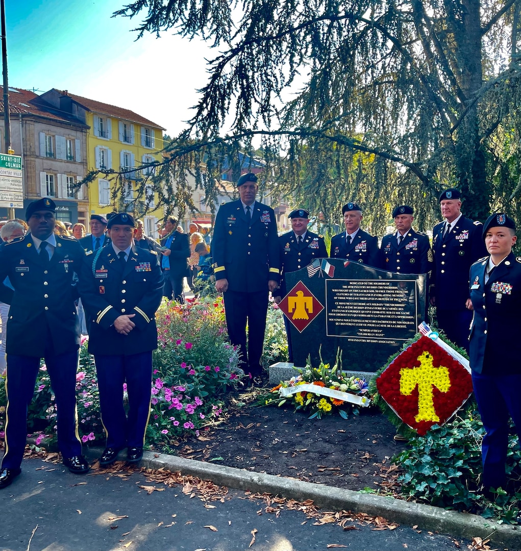 Maj. Gen. Michael Thompson, adjutant general for Oklahoma, poses with members of the Oklahoma Army National Guard around a newly dedicated memorial in Epinal, France honoring the members of the 45th Infantry Division who gave their lives while liberating France in World War II. (Photo provided by Mrs. Debbie Thompson)