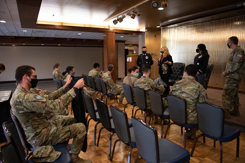 military members on peterson check out different uniform pieces that are prototypes for the united states space force