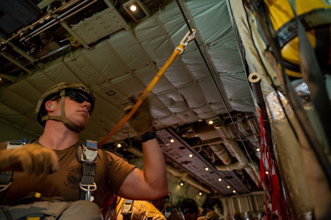 A photo of an Airman holding line.