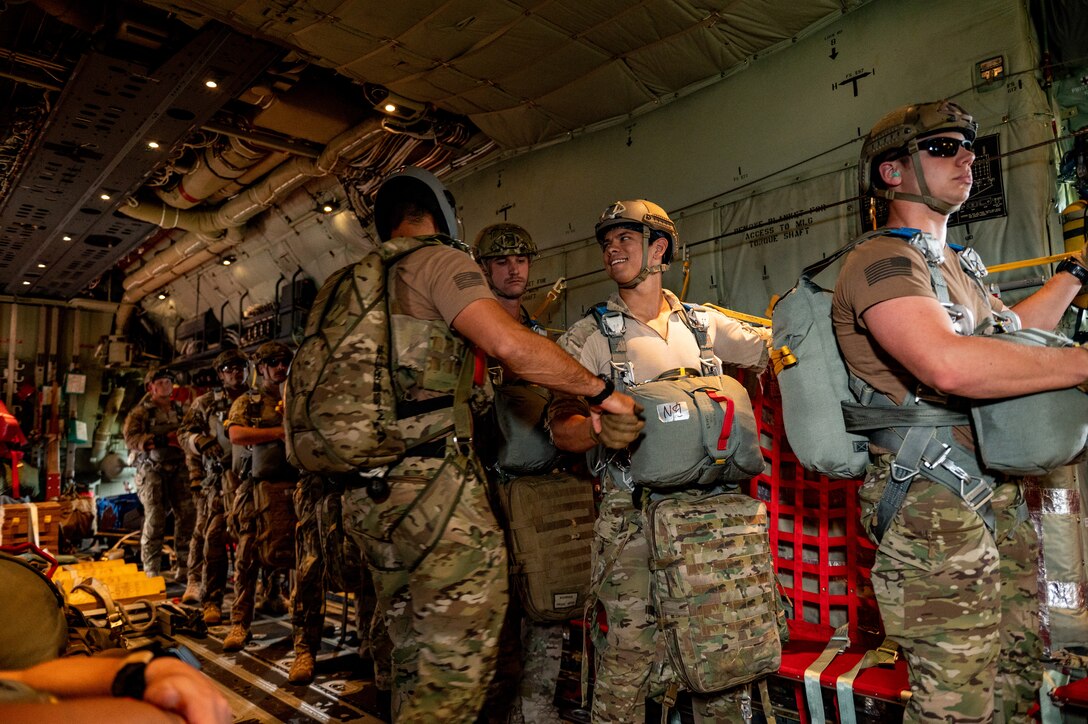 A photo of Airmen preparing to sky dive.