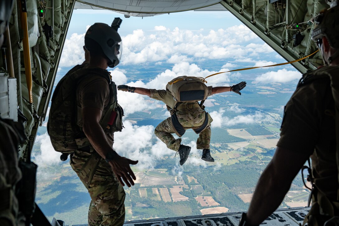 A photo of an Airman jumping.