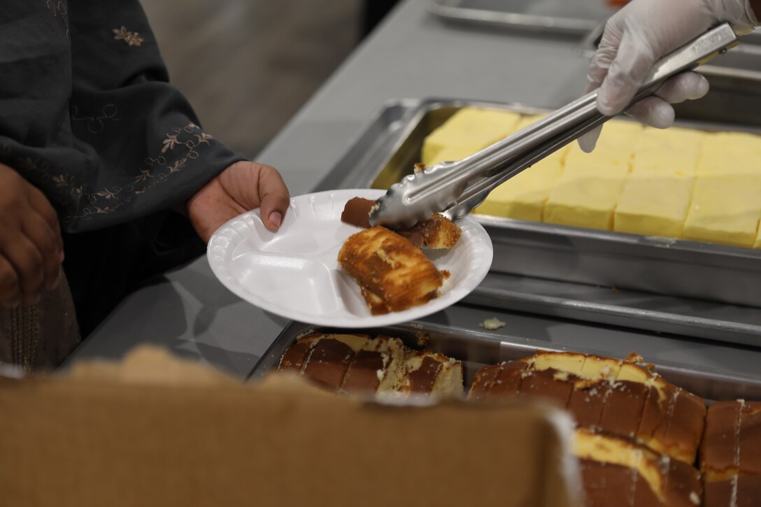 A new dining facility for Afghan evacuees was opened in Aman Omid Village Oct. 20, 2021 at Holloman Air Force Base, New Mexico. The Department of Defense, through the U.S. Northern Command, and in support of the Department of State and Department of Homeland Security, is providing transportation, temporary housing, medical screening, and general support for at least 50,000 Afghan evacuees at suitable facilities, in permanent or temporary structures, as quickly as possible. This initiative provides Afghan evacuees essential support at secure locations outside Afghanistan. (U.S. Army photo by Spc. Jose Escamilla)
