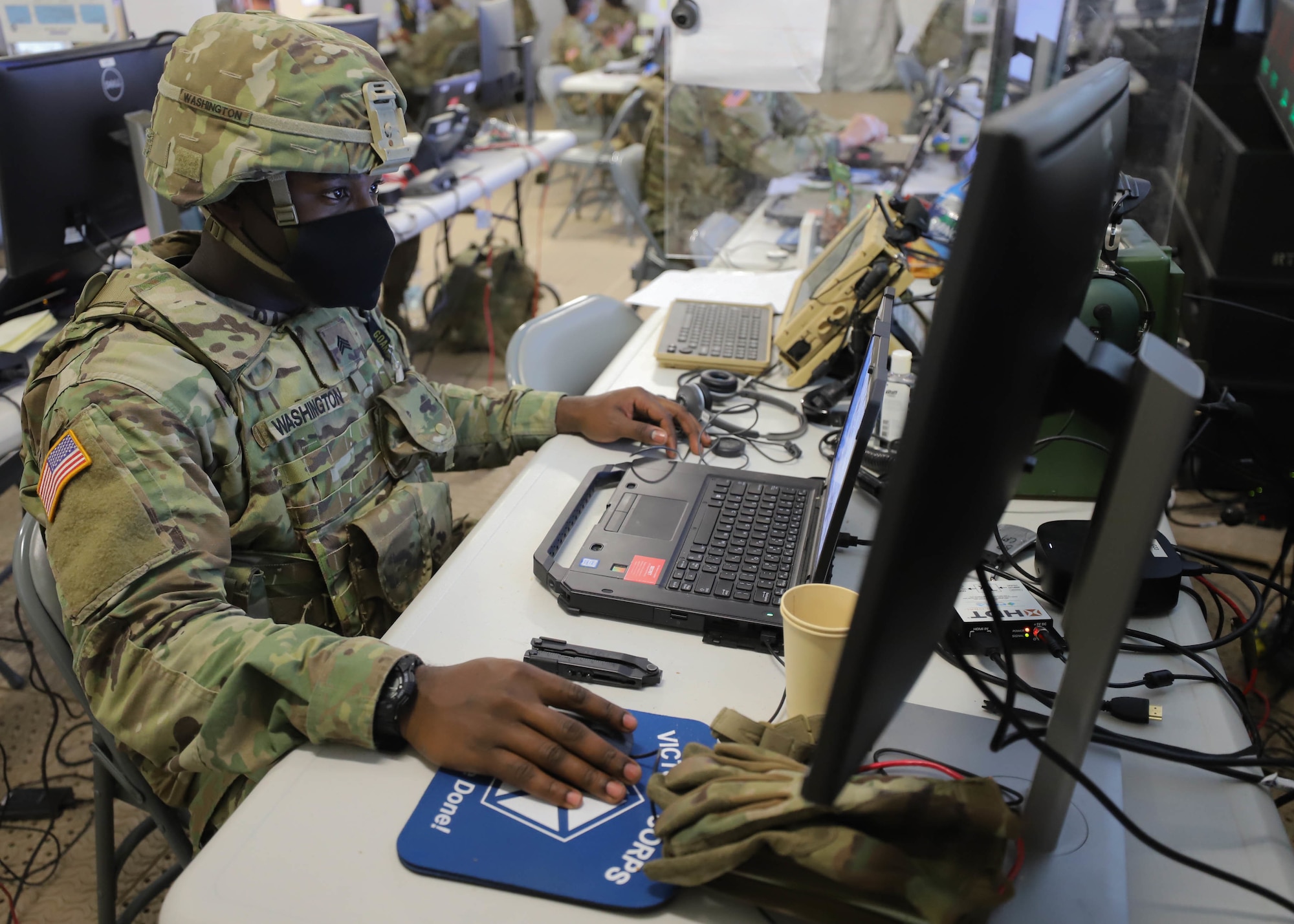 Photo of U.S. Army Soldier working on a computer