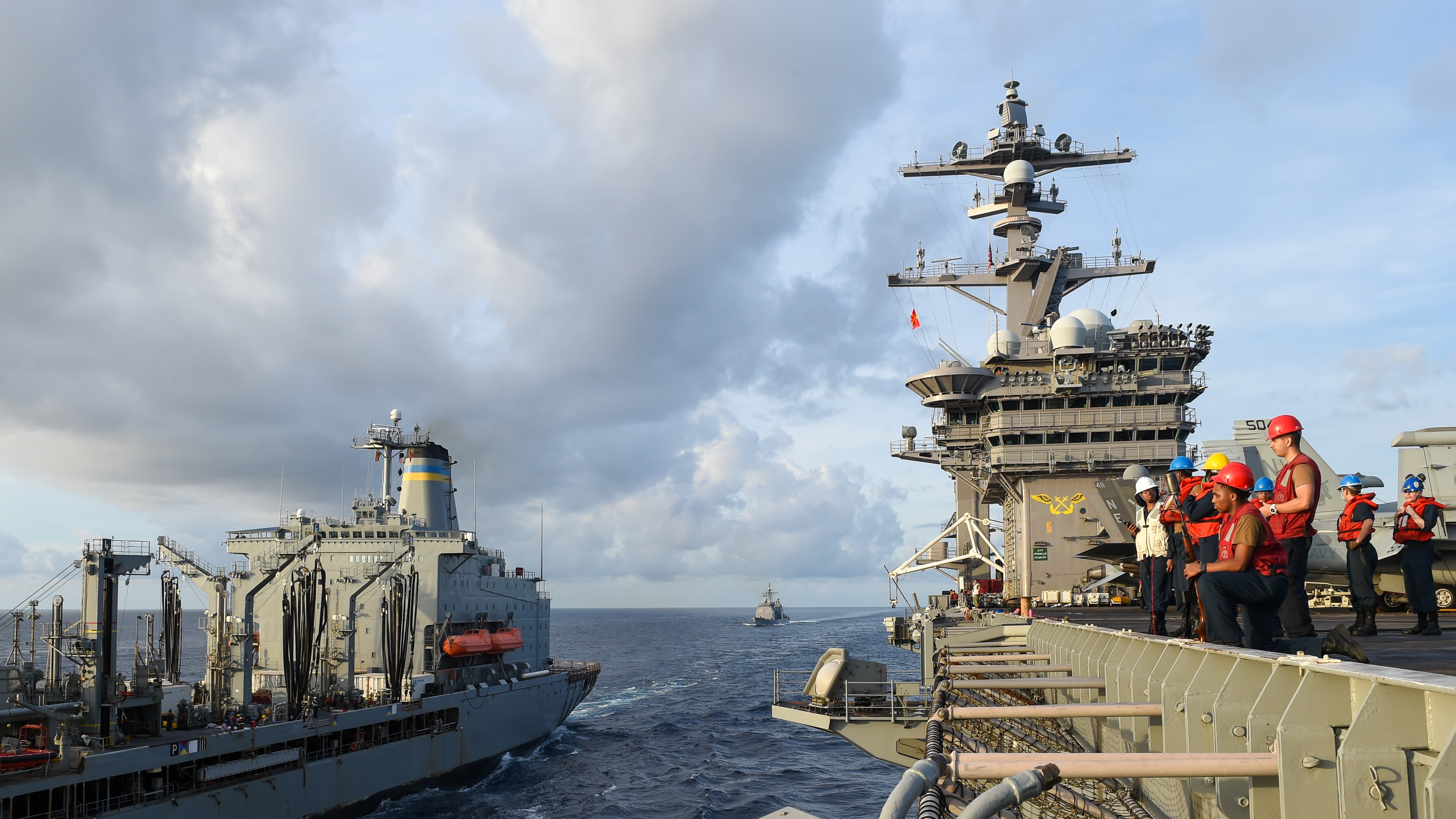 The Nimitz-class aircraft carrier USS Carl Vinson (CVN 70), conducts a refueling-at-sea with the Henry J. Kaiser-class fleet replenishment oiler USNS Big Horn (T-AO 198), Oct. 26, 2021.