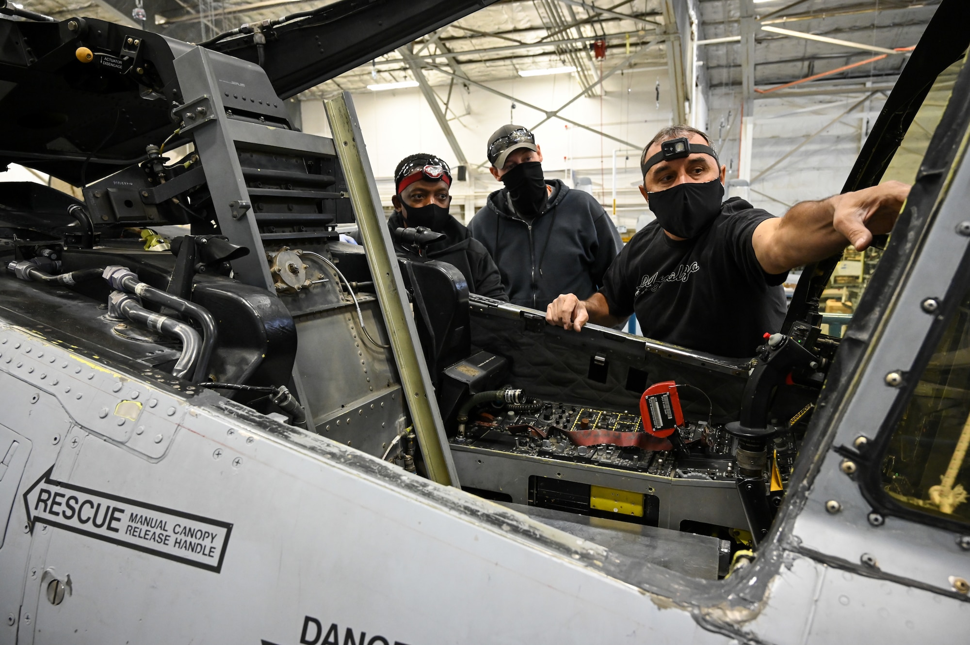 Right to left, Robert Zanone, Jonathan Powell, and Sammie Brown, 571st Aircraft Maintenance Squadron, work on A-10 Thunderbolt II, tail number 80-0264, at Hill Air Force Base, Utah, Sept. 30, 2021.