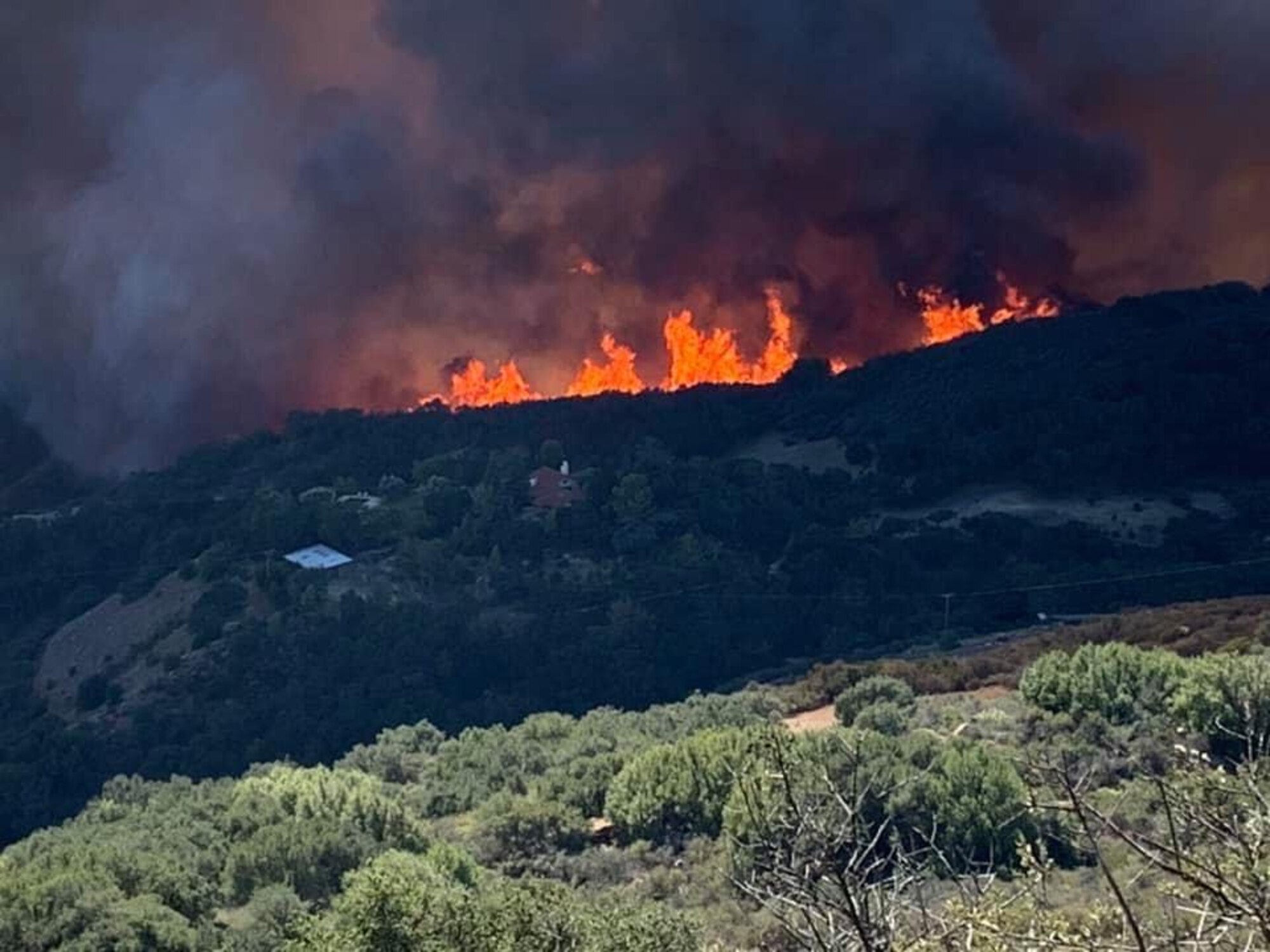 The Alisal Fire burns the land Oct. 11, 2021, at Los Padres National Forest in Goleta, Calif. The 30th Civil Engineer Squadron Fire Department provided aid during the wild fire, which consumed approximately 17,000 acres of land and lead to the evacuation of hundreds of nearby residents and ranchers. (Courtesy photo)