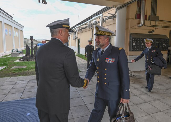Rear Adm. Christophe Cluzel, Commander French Maritime Forces, center, meets Rear Adm. Anthony Carullo, Director of Maritime Operations, during his visit to Naval Support Activity Naples, Italy, Oct. 25, 2021. U.S. Sixth Fleet, headquartered in Naples, Italy, conducts full spectrum joint and naval operations, often in concert with allied and interagency partners in order to advance U.S. national interests and security and stability in Europe and Africa.