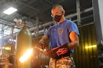 Lincoln’s ChalleNGe Academy cadets work together during a GAF Roofing Academy class to learn basic roofing skills in Rantoul, Illinois. The Academy is administered by the Illinois National Guard.