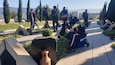 Members lay flowers at Tbilisi, Georgia military cemetery.