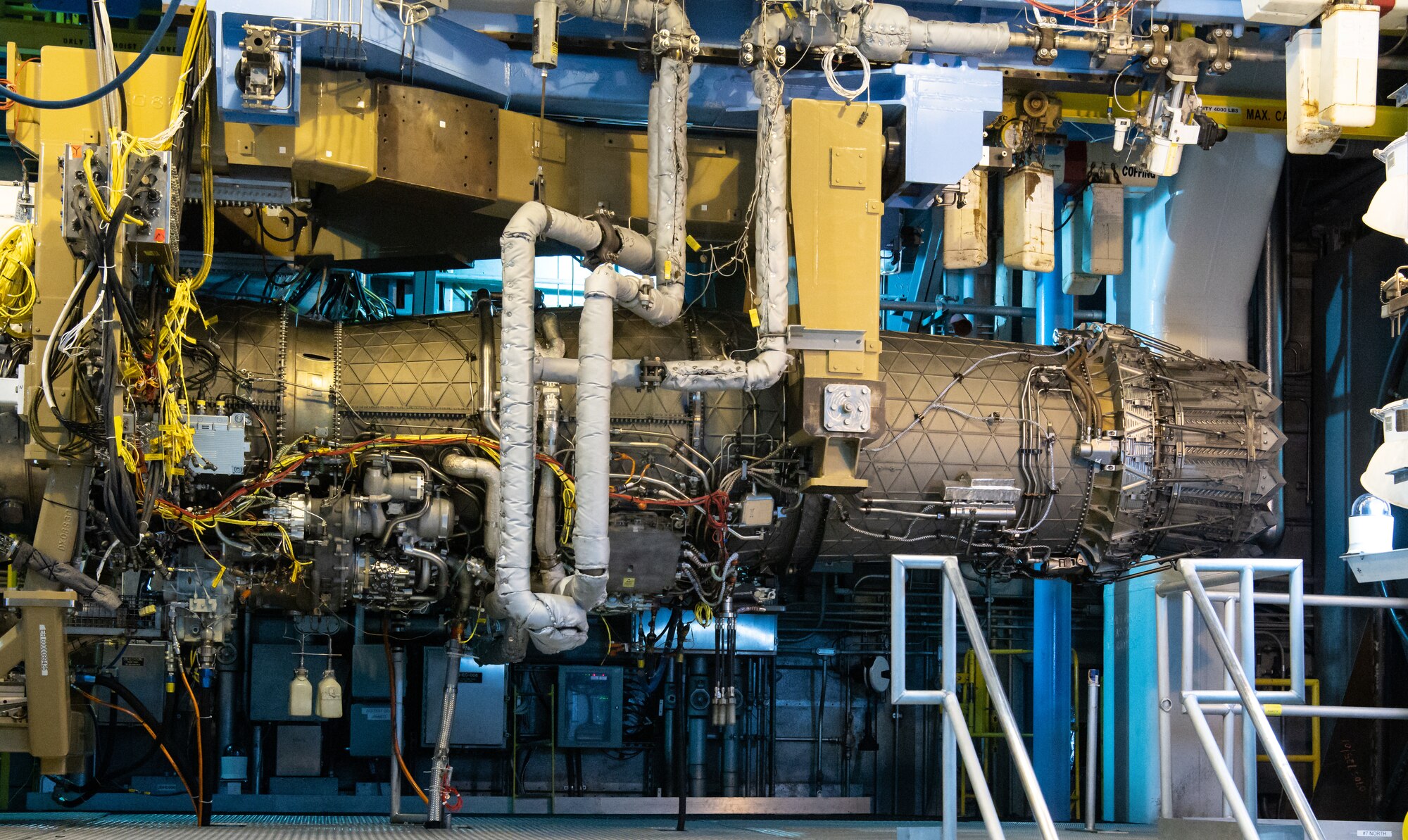A Pratt & Whitney F135 engine hangs in Arnold Engineering Development Complex (AEDC) Sea Level Test Cell 3 at Arnold Air Force Base, Tenn., between test runs Sept. 2, 2021. (U.S. Air Force photo by Jill Pickett)