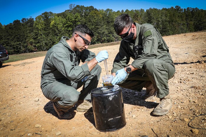 Quantico, Virginia (October 20, 2021) – U.S. Marines from The Chemical Biological Incident Response Force participate (CBIRF) in a training range designed to train Explosive Ordinance Disposal technicians (EOD), in Quantico, Virginia. Training with various chemicals and explosives and how they interact is a vital part of EOD readiness. CBIRF EOD trains year round in order to maintain their ability to allow CBIRF to respond quickly, effectively, and safely. (U.S. Marine Corps Photo by Staff Sgt. Kristian S. Karsten/Released)