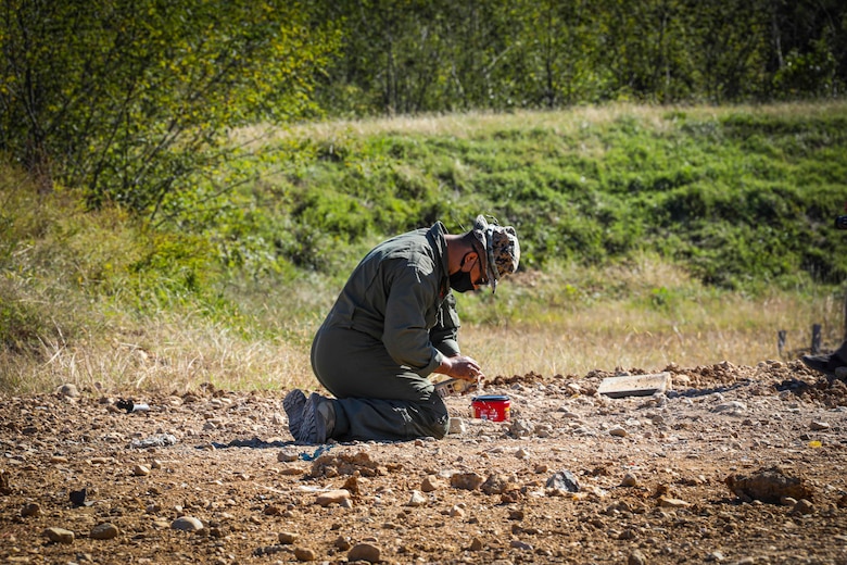 Quantico, Virginia (October 20, 2021) – U.S. Marines from The Chemical Biological Incident Response Force participate (CBIRF) in a training range designed to train Explosive Ordinance Disposal technicians (EOD), in Quantico, Virginia. Training with various chemicals and explosives and how they interact is a vital part of EOD readiness. CBIRF EOD trains year round in order to maintain their ability to allow CBIRF to respond quickly, effectively, and safely. (U.S. Marine Corps Photo by Staff Sgt. Kristian S. Karsten/Released)