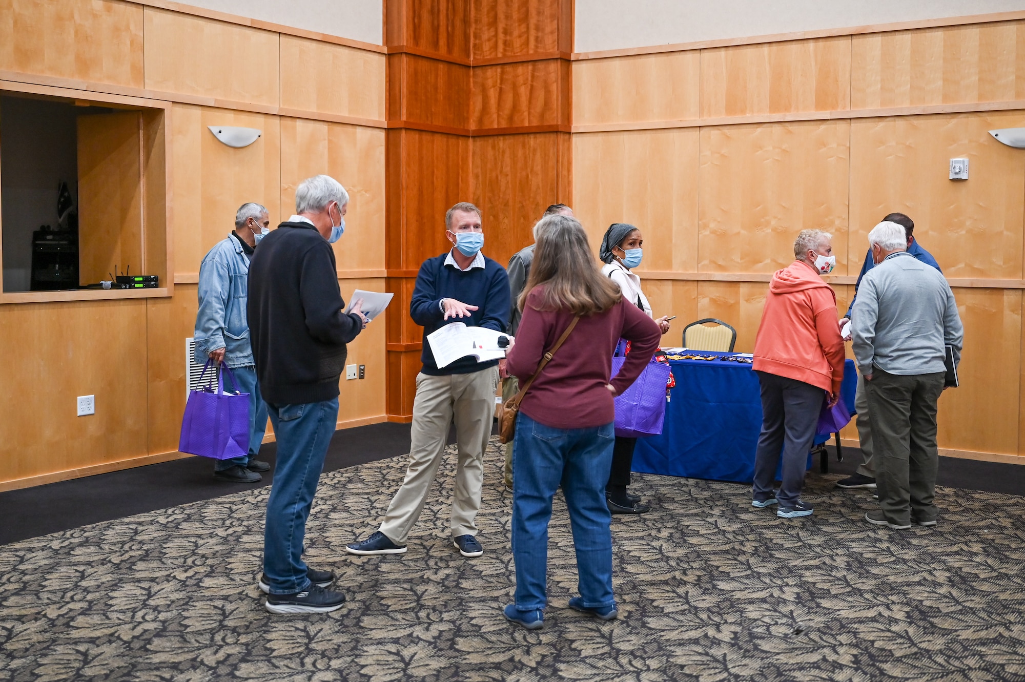 Retirees visit information tables during Retiree Appreciation Day Oct. 26, 2021, at Hill Air Force Base, Utah. The event gave the base and other agencies an opportunity to voice their gratitude for the dedicated service of the area’s approximately 22,000 military retiree population, and provided information regarding current services, information, resources and benefits. (U.S. Air Force photo by Cynthia Griggs)