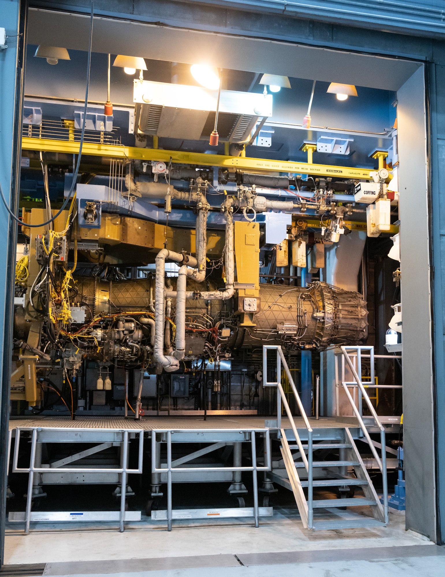 A Pratt & Whitney F135 engine hangs in Arnold Engineering Development Complex (AEDC) Sea Level Test Cell 3 at Arnold Air Force Base, Tenn., during an inspection and maintenance period Sept. 2, 2021. (U.S. Air Force photo by Jill Pickett)