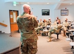 U.S. Air Force Col. Kevin Bohnsack, state air surgeon, Joint Forces Headquarters,  Michigan Air National Guard, briefs Airmen about the COVID-19 vaccine at the 110th Wing, Battle Creek Air National Guard Base, Michigan, Oct. 23, 2021. The briefing was one of a series of presentations coordinated by the 110th Medical Group before the Nov. 2 deadline for Air National Guard members to get vaccinated.