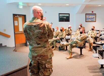 U.S. Air Force Col. Kevin Bohnsack, state air surgeon, Joint Forces Headquarters,  Michigan Air National Guard, briefs Airmen about the COVID-19 vaccine at the 110th Wing, Battle Creek Air National Guard Base, Michigan, Oct. 23, 2021. The briefing was one of a series of presentations coordinated by the 110th Medical Group before the Nov. 2 deadline for Air National Guard members to get vaccinated.