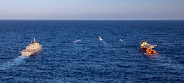 The Freedom-variant littoral combat ship USS Billings (LCS 15), participates in a photo exercise with the Dominican Republic naval coastal patrol vessel Canopus (CG 107), the special mission ship U.S. Motor Vessel Kellie Chouest, Oct. 24, 2021.