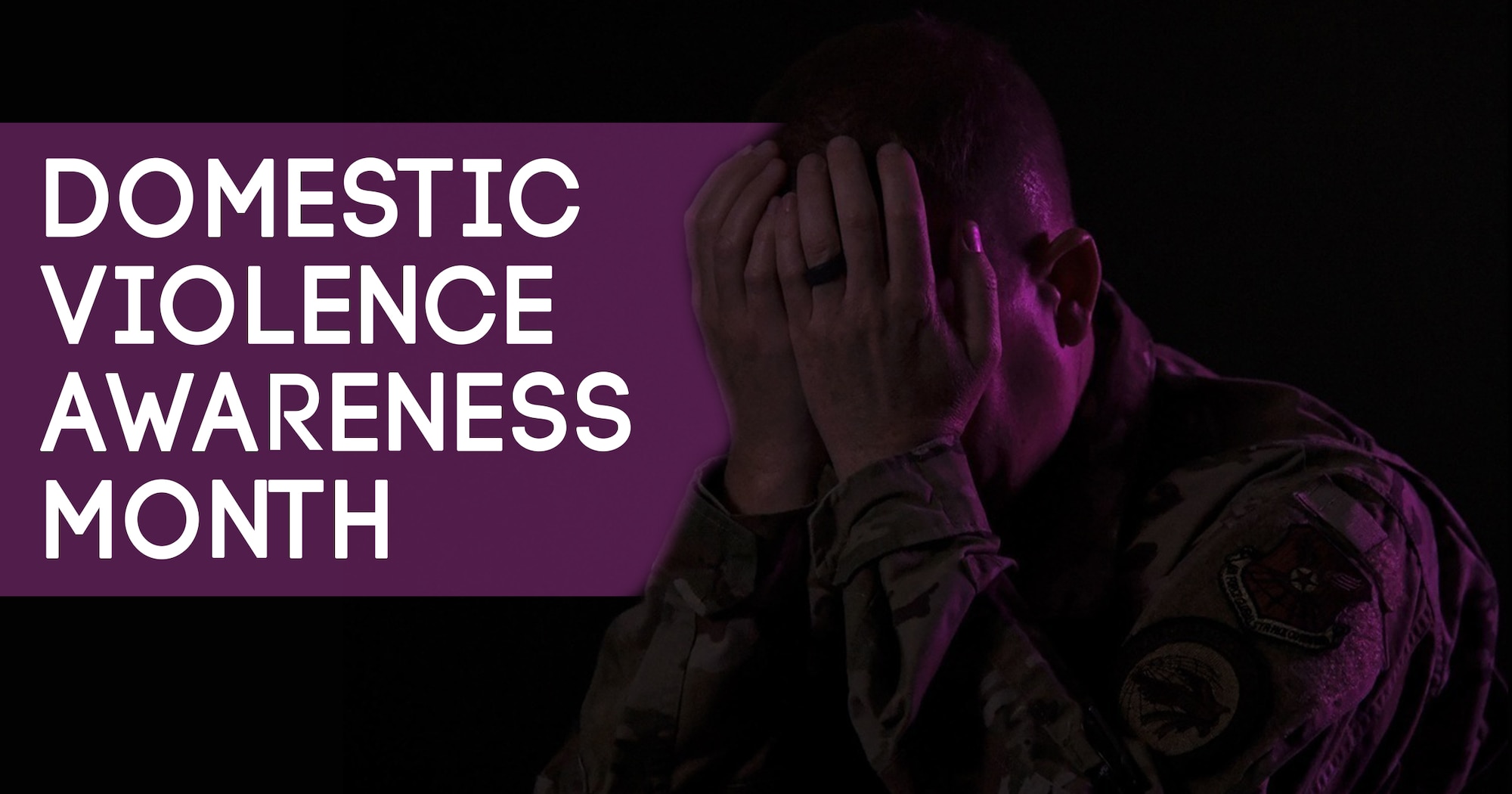 A graphic featuring the phrase Domestic Violence Awareness Month with a photo of a man with his head in his hands lit by a purple light.