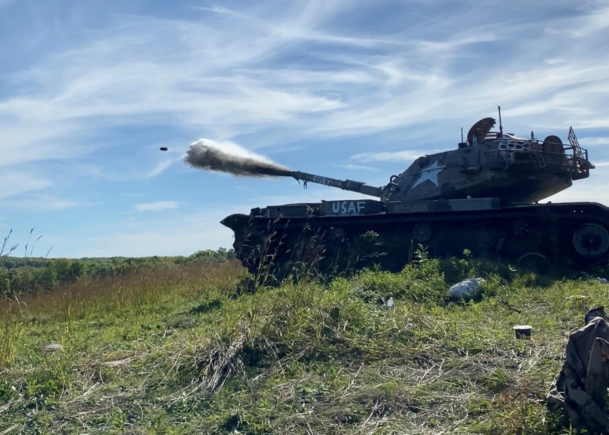 Air National Guard Explosive Ordnance technicians dislodge a stuck projectile from a decommissioned M60 tank during the Advanced EOD conventional course at Camp Ripley Training Center, Minnesota, Sept. 20-24, 2021.  (U.S. Air National Guard photo by Master Sgt. Mark Hilleren)