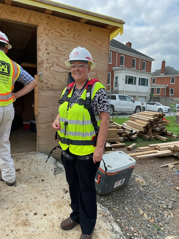Laura Wade, U.S. Army Corps of Engineers, Baltimore District, Large Contracts Branch chief, performs a site assessment during a General Instruction Building construction site visit at the U.S. Army War College, Carlisle Barracks, Pa. The Contracting office is responsible for providing business opportunities for individuals and firms, Veteran Owned, Small Disadvantaged Business and Small Women-Owned businesses, in the civilian community through engineering and construction management work. (Courtesy photo)
