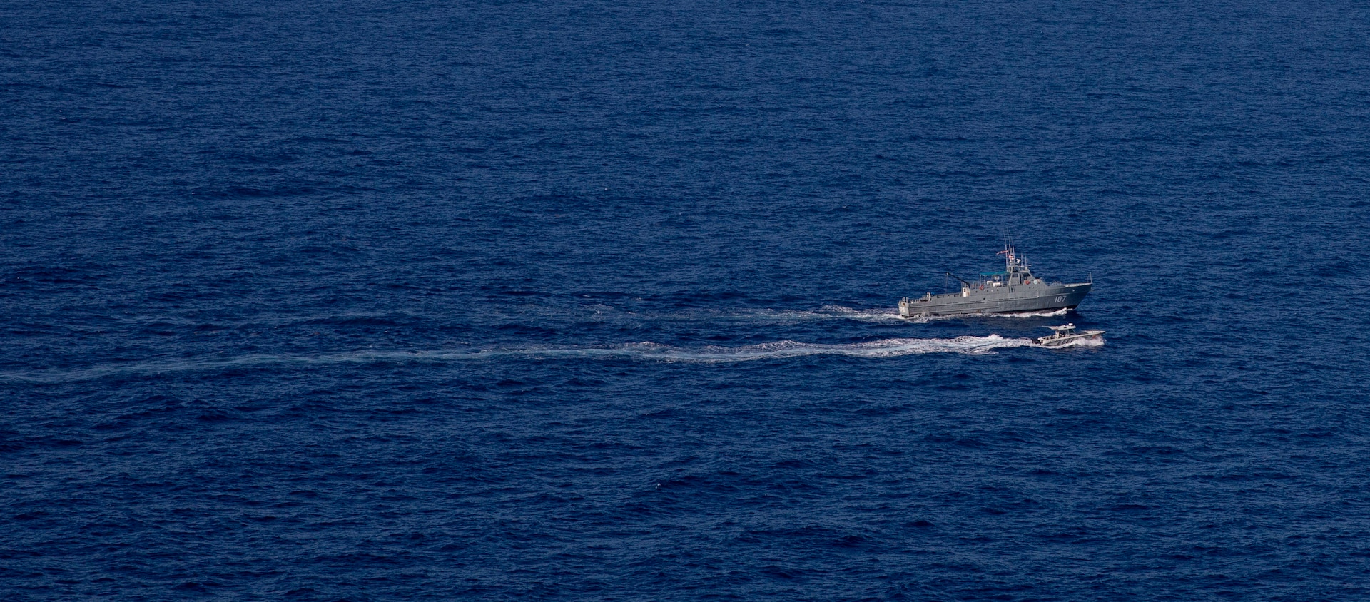 Dominican Republic Navy coast patrol vessel Canopus (CG 107), along a Dominican Republic small boat arrive for a maritime operations exercise with the USS Billings (LCS 15), Oct. 24, 2021.