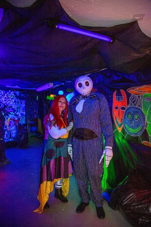 Sergeant Major Edward Kretschmer and his wife Julia, dressed as Jack and Sally, prepared to spook guests in the Haunted Tunnel, as part of the 3rd annual Trunk or Treat held aboard Marine Corps Logistics Base Barstow, California, Oct. 27.