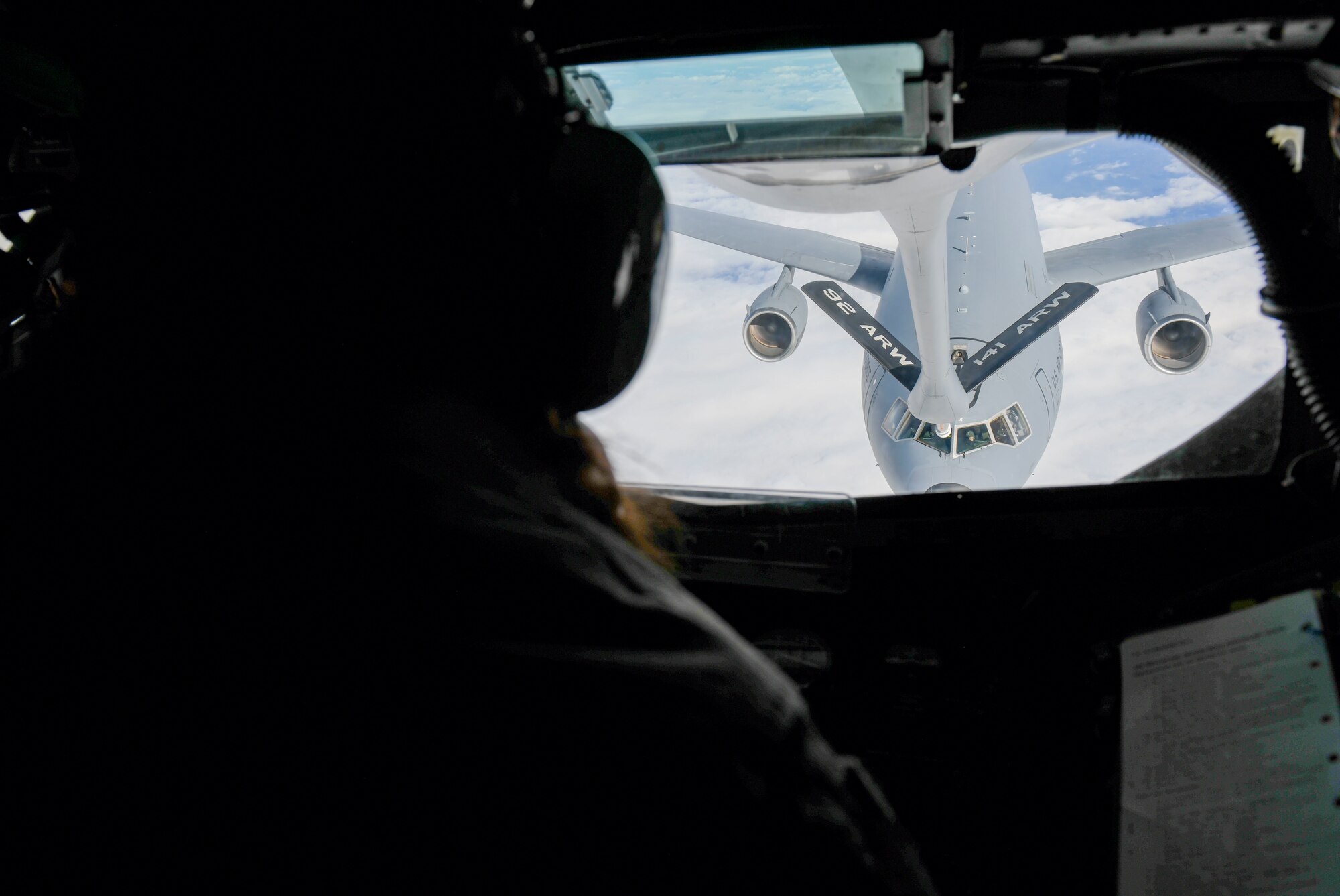 A KC-10 Extender is refueled by a KC-135 Stratotanker during an orientation flight for the Spokane Indians minor league baseball team administration, Oct. 27, 2021. Flights with local community members and civic leaders allow Team Fairchild to openly communicate and showcase their mission in a unique environment.  (U.S. Air Force photo by Senior Airman Kiaundra Miller)