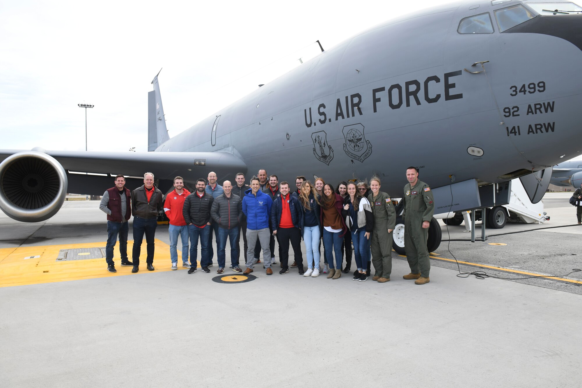 The Spokane Indians minor league baseball team administration and 92nd Air Refueling Squadron pilots pose in front of a KC-135 Stratotanker at Fairchild Air Force Base, Washington, Oct. 27, 2021. The Spokane Indians leadership team flew with the 92nd ARS crew as part of Operation Fly Together, a joint partnership that was built between Fairchild and the minor league team, intended to build deeper relationships with organizations throughout the community. (U.S. Air Force photo by Senior Airman Kiaundra Miller)