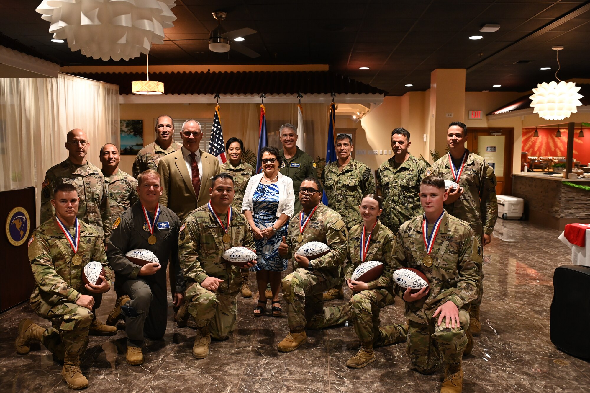 Gov. of Guam Lou Leon Guererro and Guam military leaders pose with the winners of the Guam Missile Defender of the Year Award at Andersen Air Force Base, Oct. 28, 2021