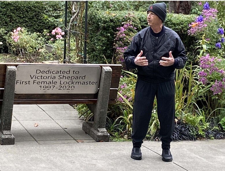 Photo of Allen Schwerer, retired senior operator at the Lake Washington Ship Canal and Hiram M. Chittenden Locks, gives words of praise for his former coworker Victoria "Vickie" Shepard.