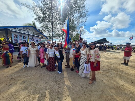 Members of the Civic Action Team Palau stand with locals during a Olechotel Belau Fair and United Nations Day celebration. OBF is a showcase of Palauan culture. The event included food, souvenirs, dances, singing and more. Over 20 countries participated in the event with flags, national anthems and cultural dances. The CAT Palau had the privilege of marching behind the Palauans, and giving a speech about their appreciation for Palau's continued support and involvement with the 36th Wing and the United States. The CAT is working with locals on community projects, apprenticeship training, vehicle maintenance, medical support and construction. They will be on island into the New Year.  (Courtesy Photo)