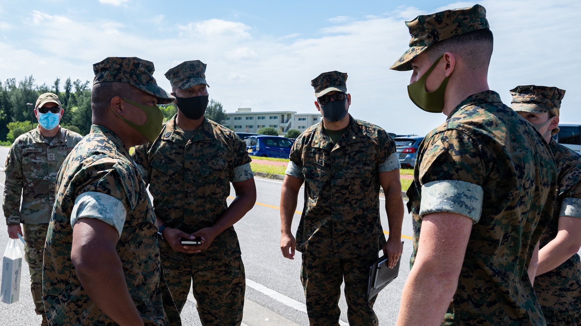 A Marine talks with other Marines.