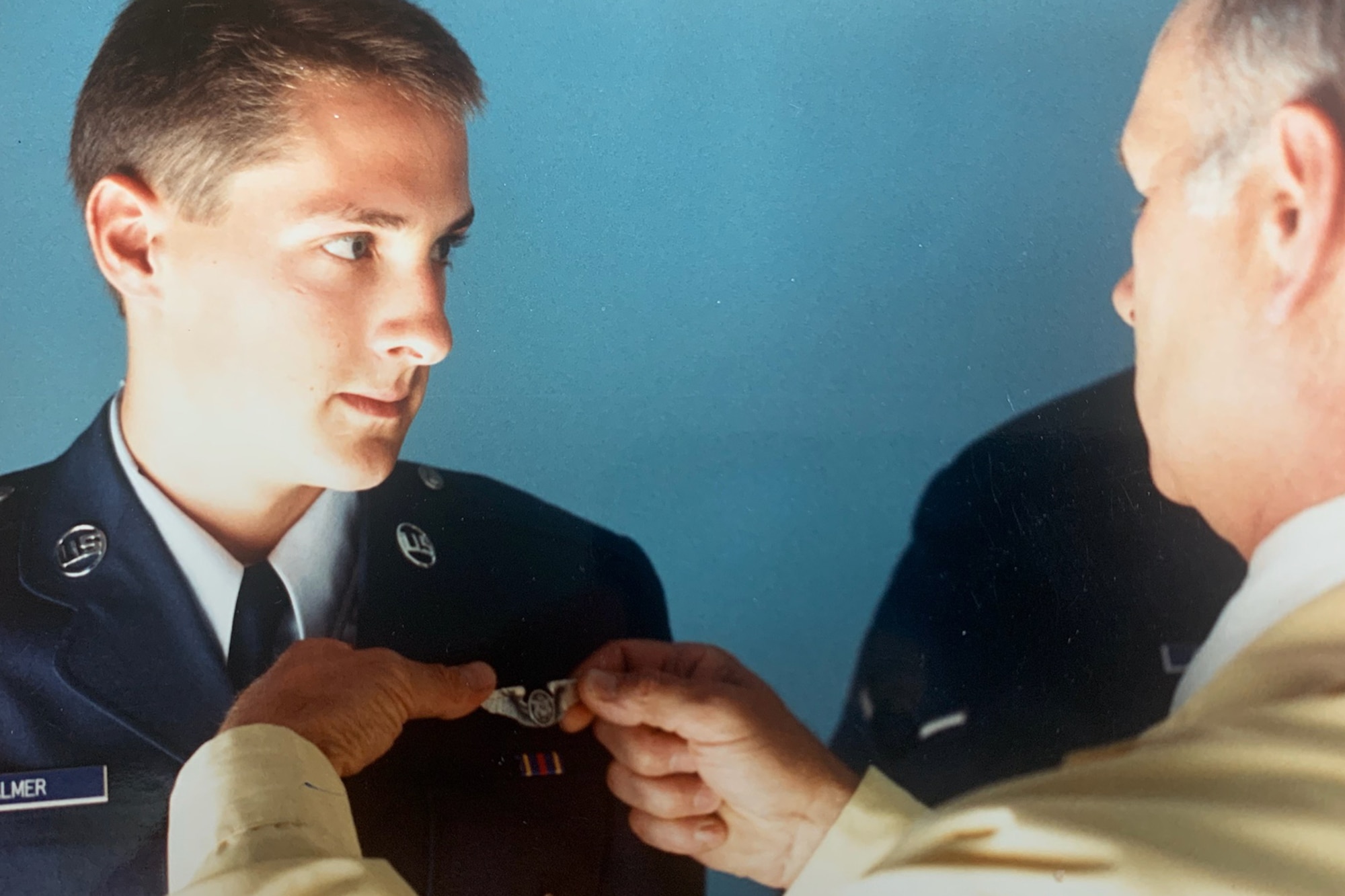 Airman pins on wings.
