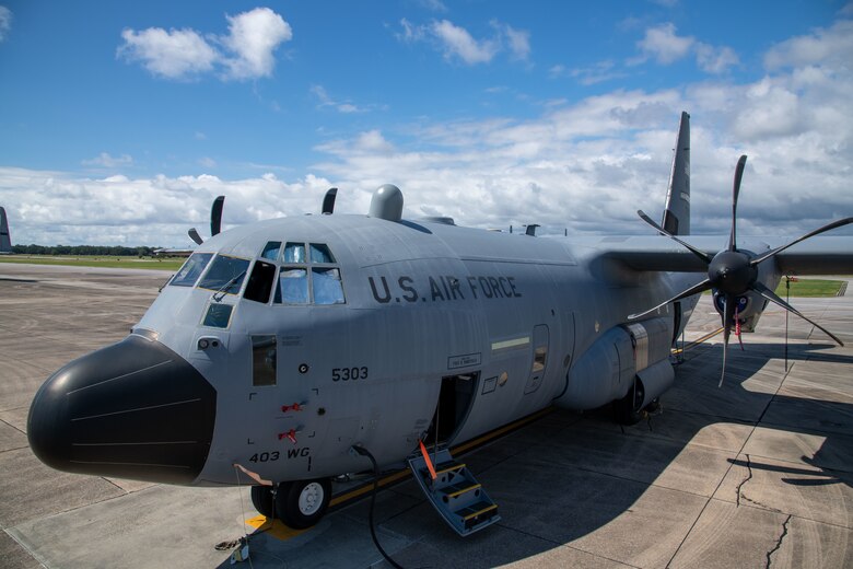 A WC-130J Super Hercules aircraft assigned to the 53rd Weather Reconnaissance Squadron sits on the flightline at Keesler Air Force Base, Miss., Oct. 12, 2021. The attachment on top of the aircraft is a satellite antenna the squadron tested that will enhance in-flight data transmission capabilities, resulting in more information for forecasters at the National Hurricane Center to work with.