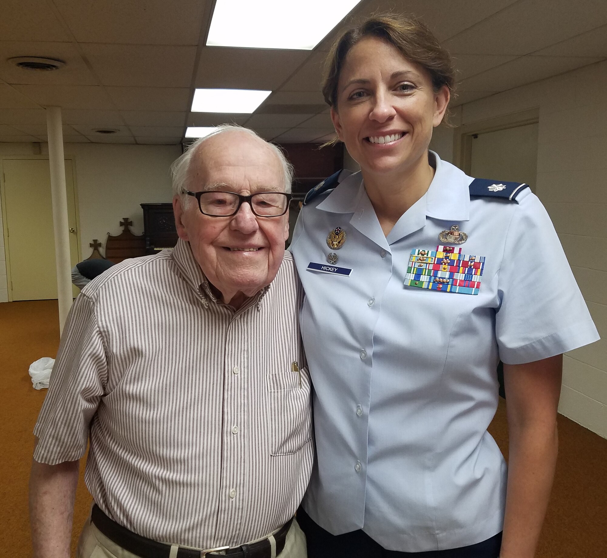 Former 14th Intelligence Squadron commander Lt. Col. (retired) Dianne Hickey, poses with John “Jerry” Johnson during his visit to Wright-Patterson Air Force Base, Ohio in 2016. Johnson passed away Oct. 19, 2021 and had served in Guam during World War II with the Army Air Corps in the 20th Air Force 9th Photographic Technical Squadron. His squadron ultimately became the 14 IS. Hickey and current 14 IS reservists Maj. Andrew Soine and Senior Master Sgt. Jonathon Washington conducted the funeral honors Oct. 23, 2021.
