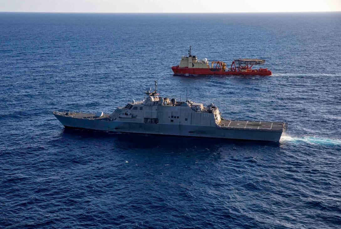 he Freedom-variant littoral combat ship USS Billings (LCS 15) participates in a photo exercise with the special mission ship U.S. Motor Vessel Kellie Chouest, Oct. 24, 2021.