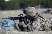 Sgt. 1st Class Alterek Blake, assigned to the 389th Combat Sustainment Support Battalion, conducts individual weapons qualification at Fort Hood, Texas, supported by observer coach/trainers from the 2nd Battalion, 337th Regiment, October 20, 2021.