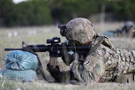 Sgt. 1st Class Alterek Blake, assigned to the 389th Combat Sustainment Support Battalion, conducts individual weapons qualification at Fort Hood, Texas, supported by observer coach/trainers from the 2nd Battalion, 337th Regiment, October 20, 2021.