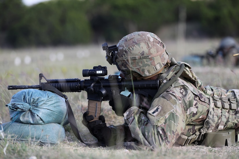 Sgt. 1st Class Alterek Blake, assigned to the 389th Combat Sustainment Support Battalion, conducts individual weapons qualification at Fort Hood, Texas, supported by observer coach/trainers from the 2nd Battalion, 337th Regiment, October 20, 2021.