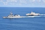 Japan Maritime Self-Defense Force Murasame-class destroyer JS Yudachi (DD 103), left, and Independence-variant littoral combat ship USS Jackson (LCS 6) sail together in the South China Sea. Jackson, part of Destroyer Squadron Seven, are on a rotational deployment in the U.S. 7th Fleet area of operation to enhance interoperability with partners and serve as a ready-response force in support of a free and open Indo-Pacific region.